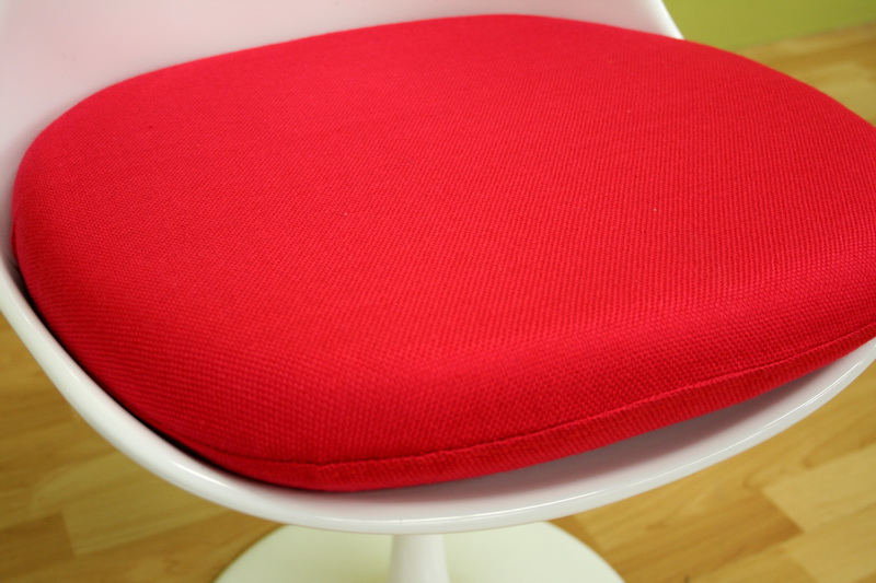  is a detachable red woven fabric cushion made of high density foam 